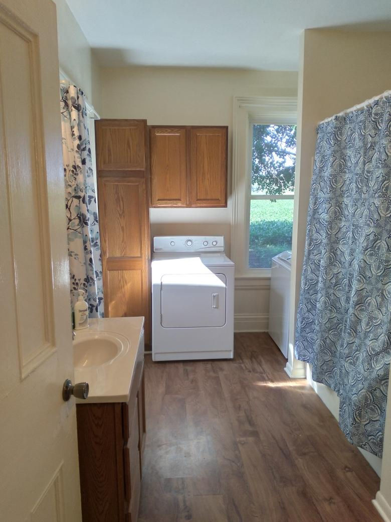 5122 North Bennett Road Monroe Center, IL 61052 - Photo 17 of 29 a bathroom with a sink toilet and shower