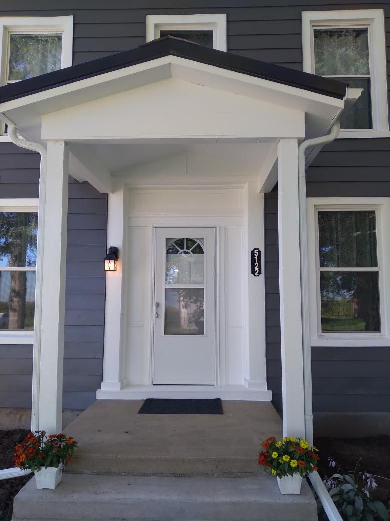 5122 North Bennett Road Monroe Center, IL 61052 - Photo 2 of 29 a front view of a house