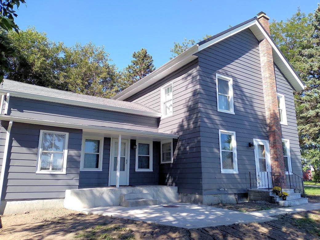 5122 North Bennett Road Monroe Center, IL 61052 - Photo 21 of 29 a view of a house with a patio