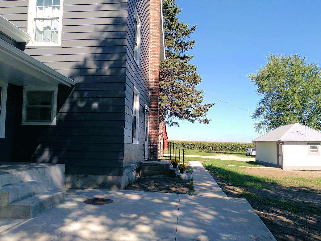 5122 North Bennett Road Monroe Center, IL 61052 - Photo 22 of 29 a view of a house with a yard