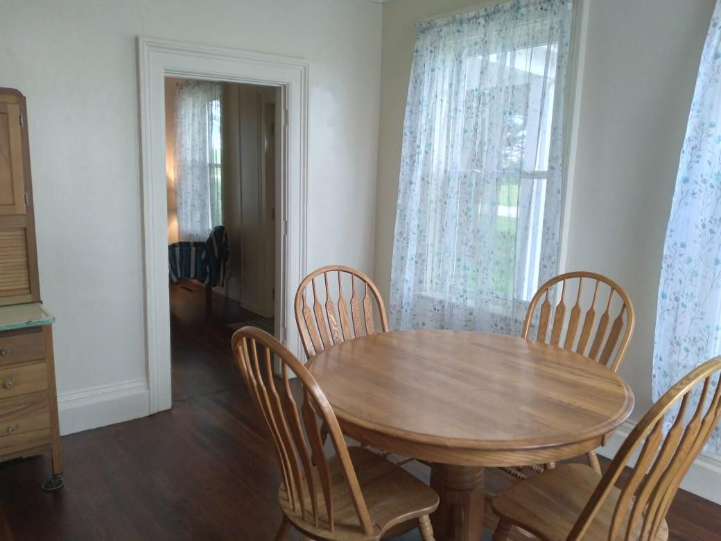 5122 North Bennett Road Monroe Center, IL 61052 - Photo 6 of 29 a view of a dining room with furniture and window