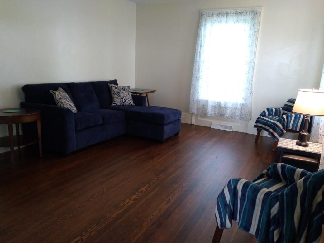 5122 North Bennett Road Monroe Center, IL 61052 - Photo 7 of 29 a living room with furniture and a flat screen tv