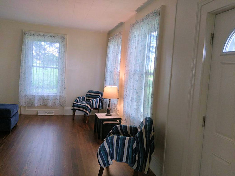 5122 North Bennett Road Monroe Center, IL 61052 - Photo 8 of 29 a view of a workspace with furniture and a window