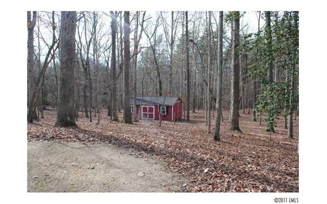 116 Generals Way, Unit 5 Clover, SC 29710 - Photo 15 of 16 a backyard of a house with lots of green space