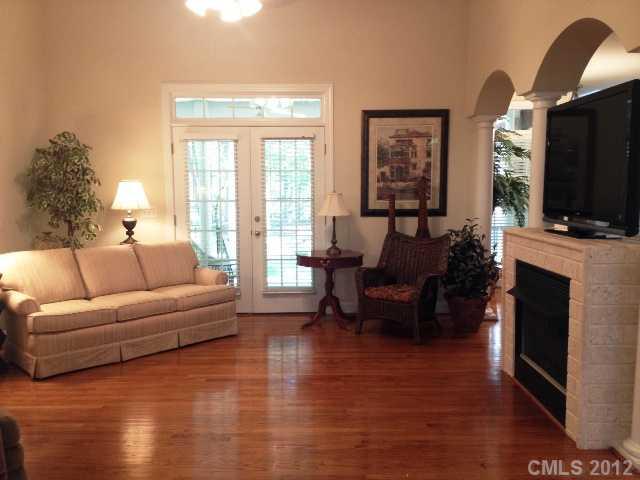 116 Generals Way, Unit 5 Clover, SC 29710 - Photo 3 of 16 a living room with furniture a large window and a flat screen tv