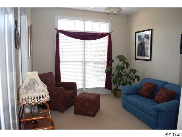 116 Generals Way, Unit 5 Clover, SC 29710 - Photo 10 of 16 a living room with furniture and a large window