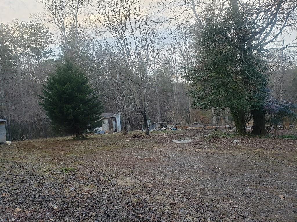 1576 Boone Gap Road Boomer, NC 28606 - Photo 1 of 22 Mobile home seen in previous photos has been removed. Scroll through additional pictures to see before and after. Owner still working on removing block foundation.