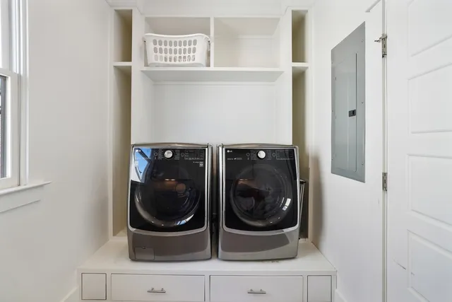 a utility room with dryer and washer