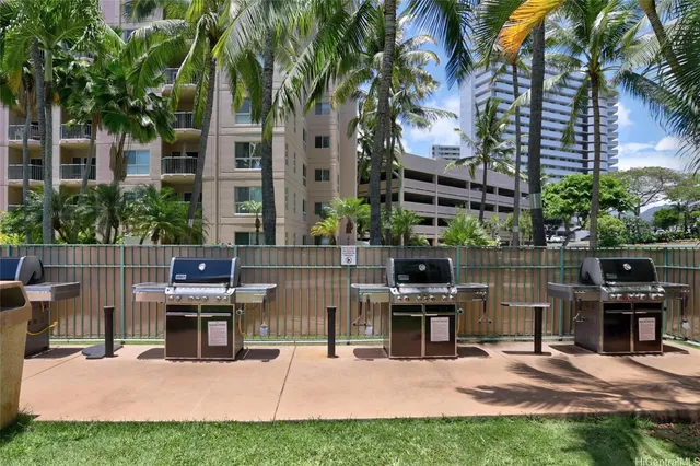 a view of street with parked cars
