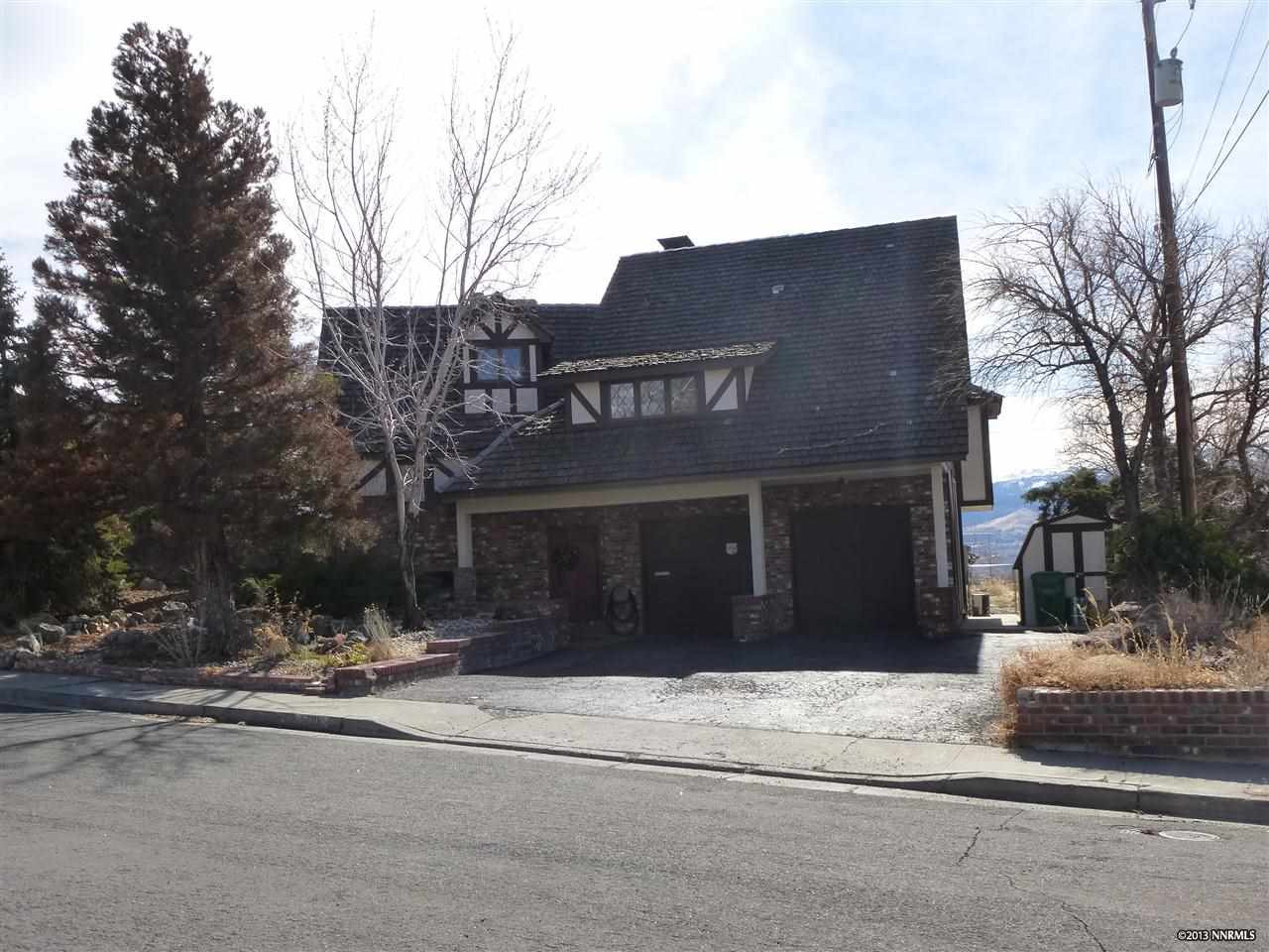 410 Moraine Way Reno, NV 89503 - Photo 1 of 1 a view of a house with a yard