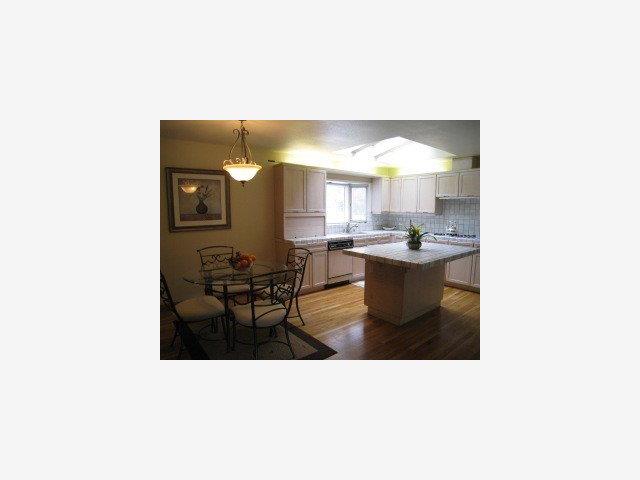 1452 Brookmill Road Los Altos, CA 94024 - Photo 2 of 9 a kitchen with a table and chairs in it