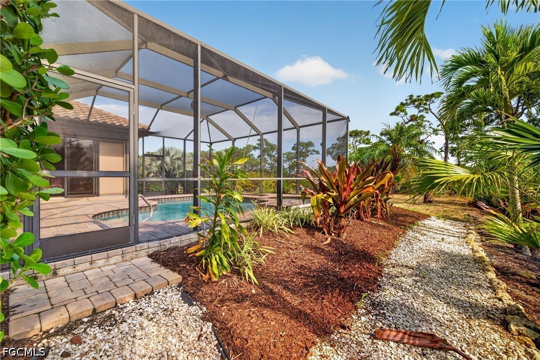 6109 Calusa Rdg Trail Bokeelia, FL 33922 - Photo 42 of 48 a view of a backyard