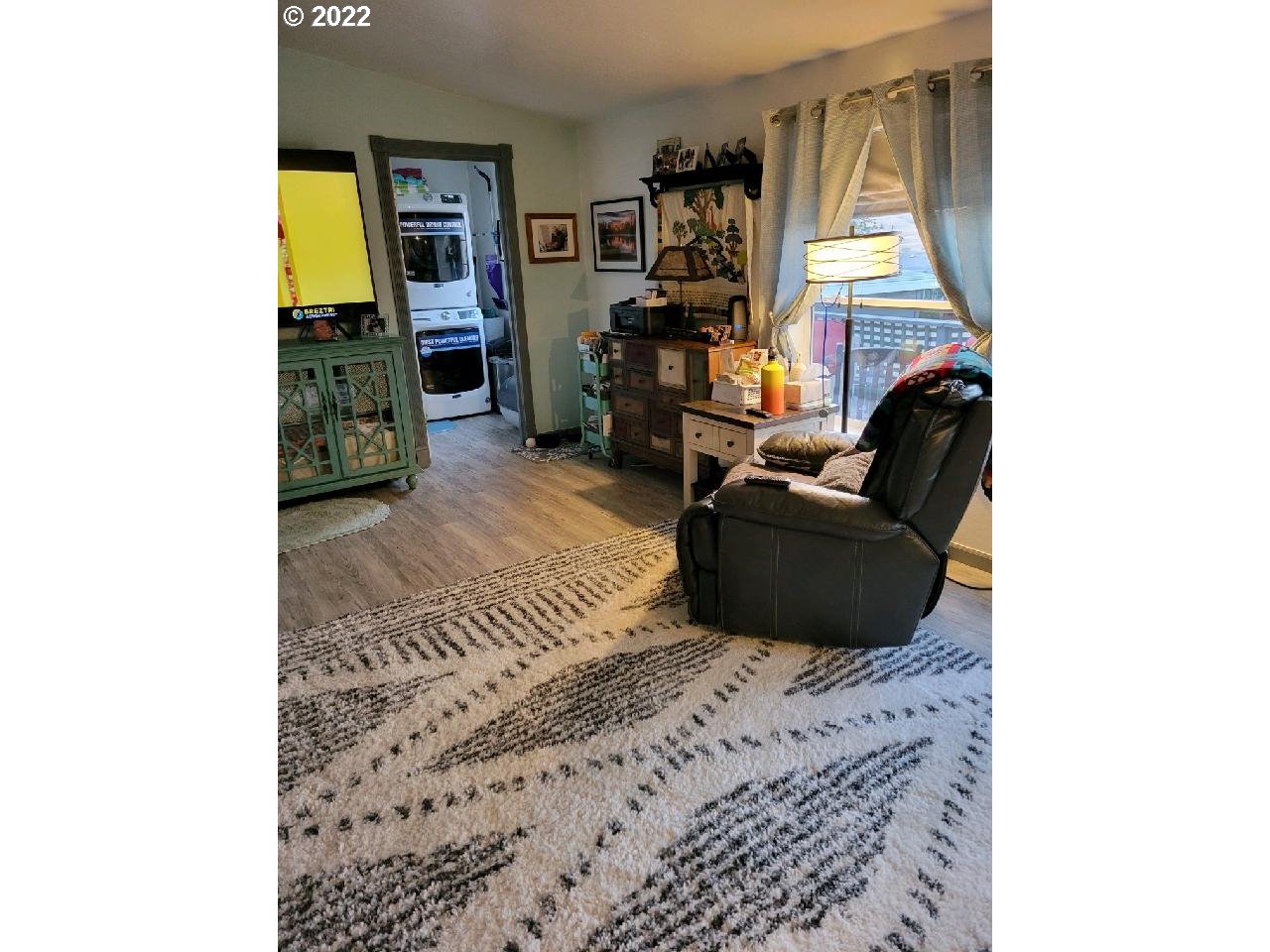 2600 Southwest Goodwin Avenue, Unit 5 Pendleton, OR 97801 - Photo 21 of 31 a living room with furniture and a window