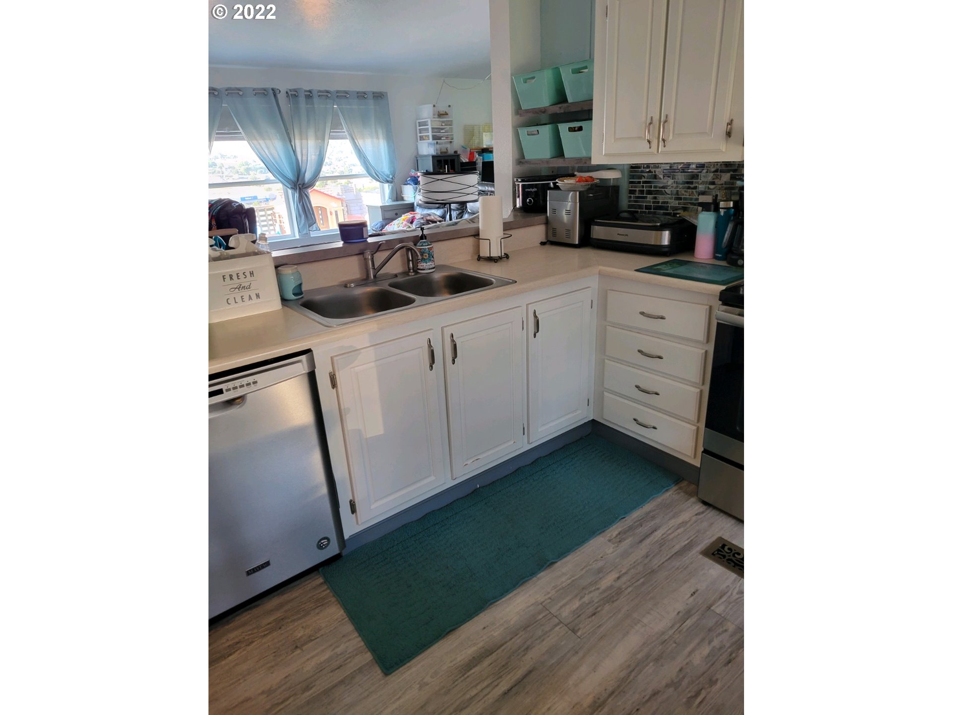 2600 Southwest Goodwin Avenue, Unit 5 Pendleton, OR 97801 - Photo 25 of 31 a kitchen with a sink cabinets and window
