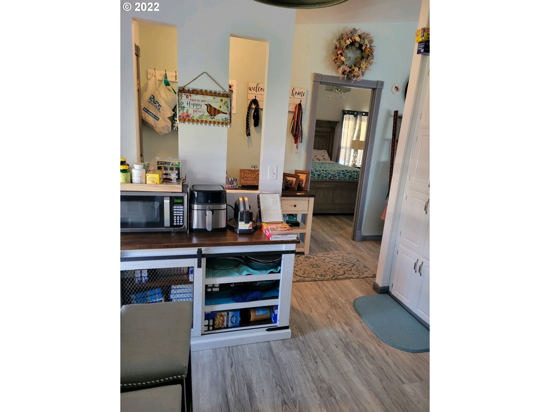 2600 Southwest Goodwin Avenue, Unit 5 Pendleton, OR 97801 - Photo 26 of 31 a view of a dining room with furniture and wooden floor