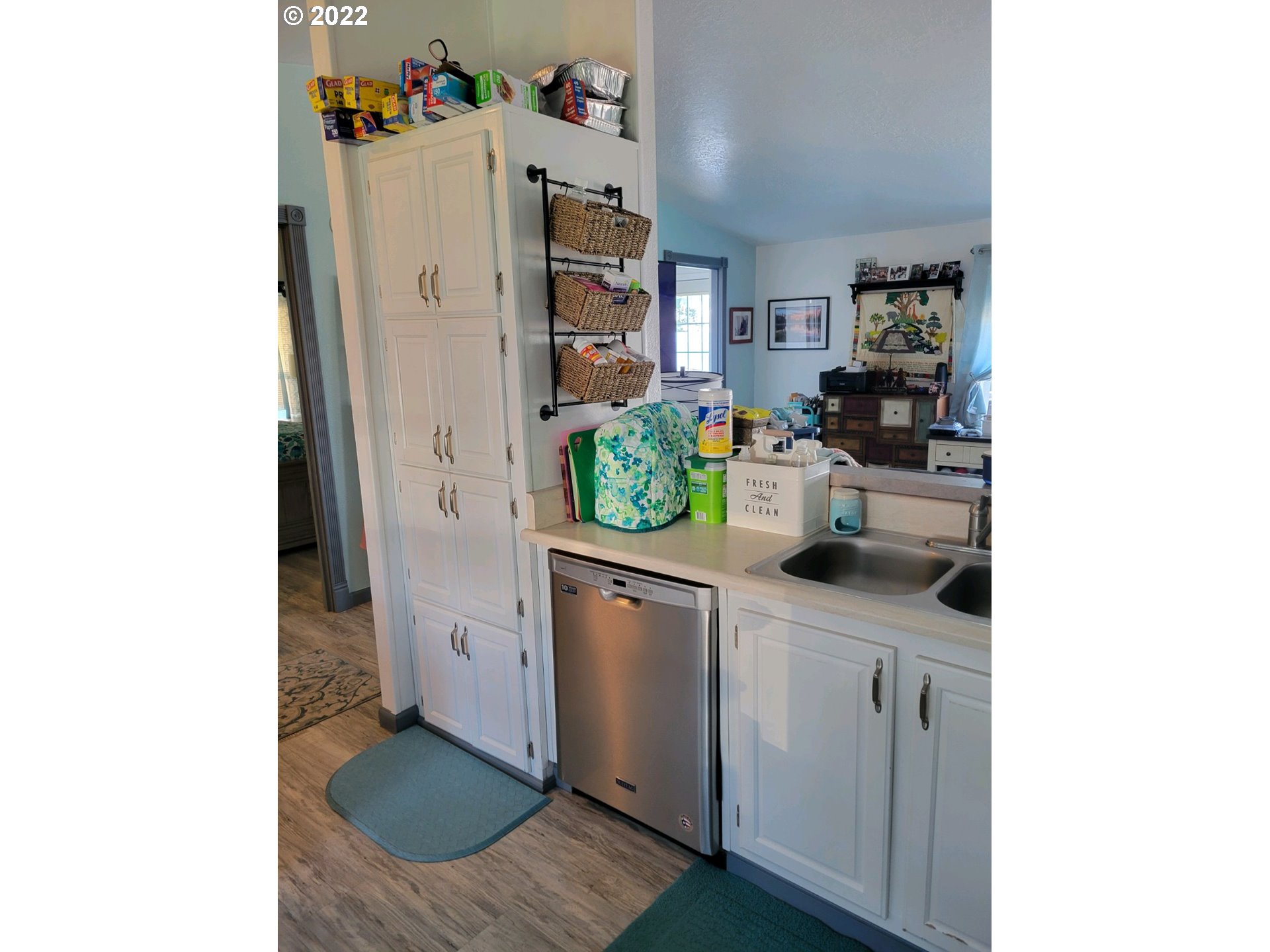 2600 Southwest Goodwin Avenue, Unit 5 Pendleton, OR 97801 - Photo 27 of 31 a kitchen with stainless steel appliances granite countertop a sink and a refrigerator
