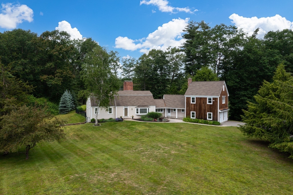 46 Baldpate Road Boxford, MA 01921 - Photo 3 of 42 a house view with a garden space