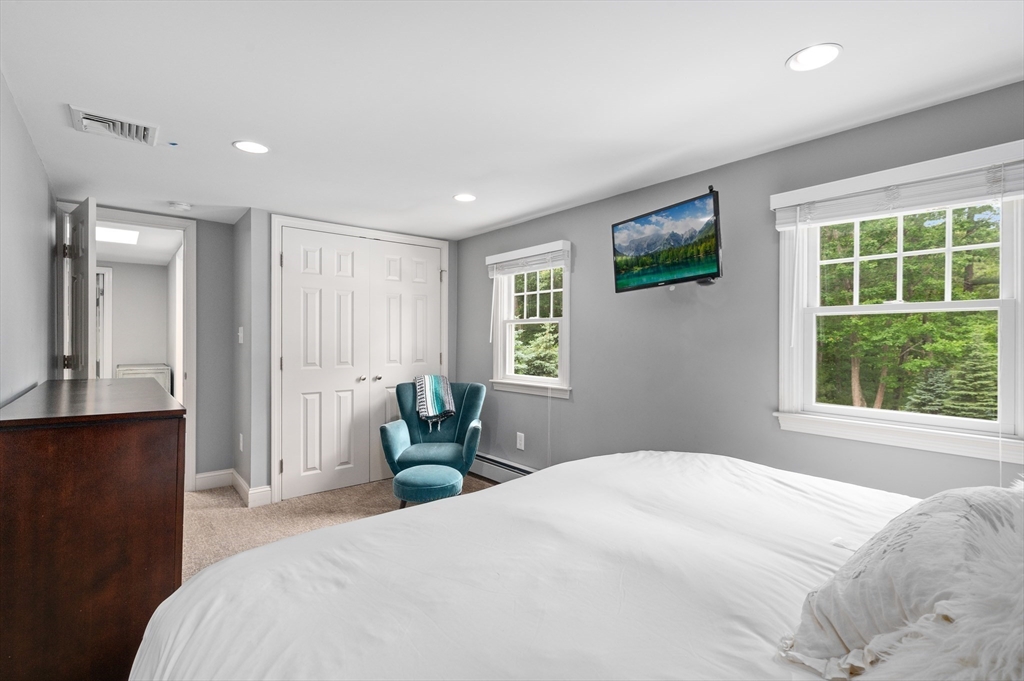 46 Baldpate Road Boxford, MA 01921 - Photo 39 of 42 a bedroom with a bed and a window