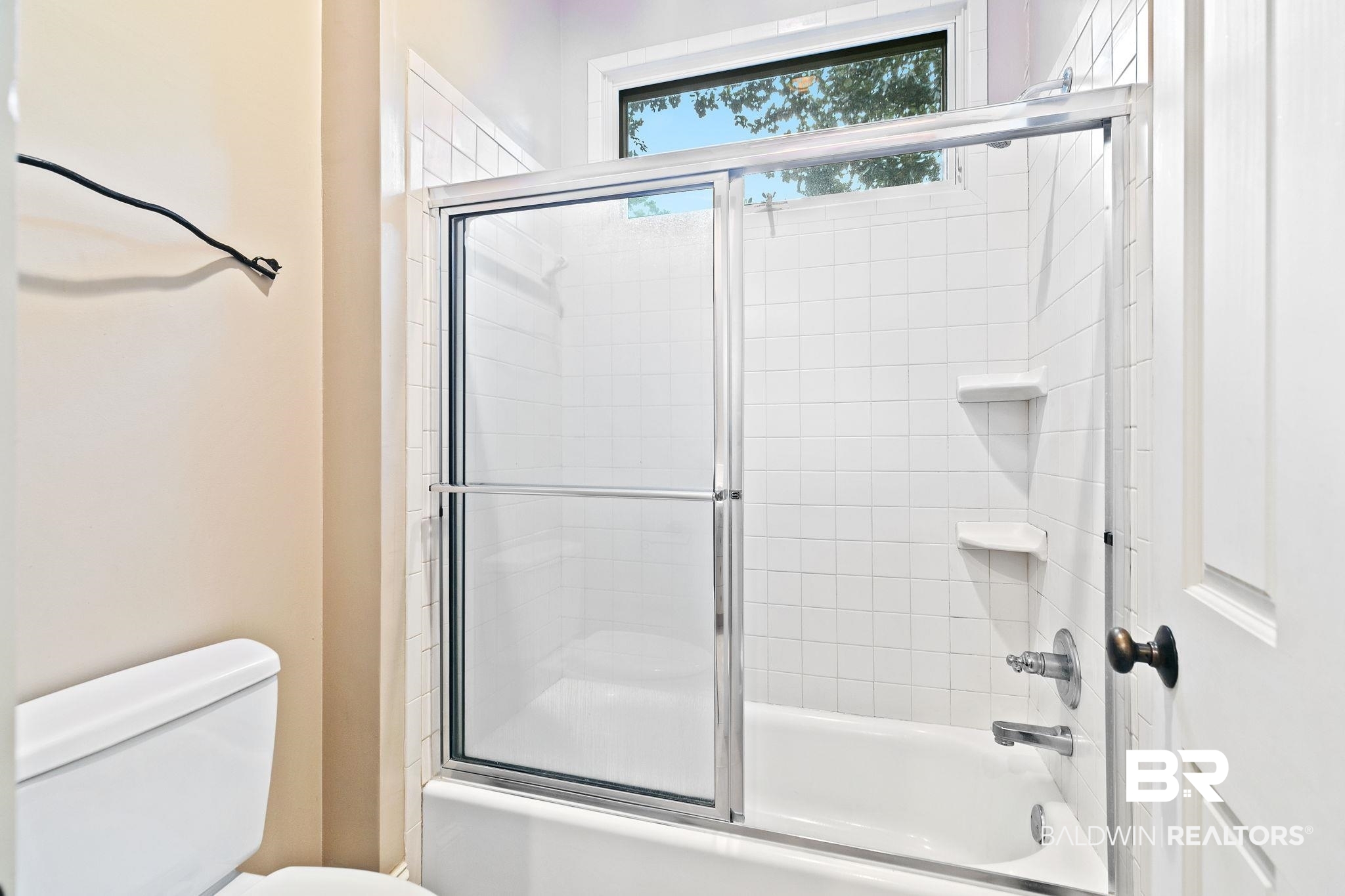 202 Beall Lane Daphne, AL 36526 - Photo 29 of 46 Bathroom featuring bath / shower combo with glass door and toilet