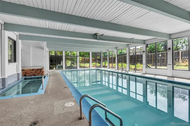 a view of a patio with a table chairs