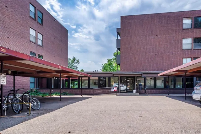 a view of street with parked cars