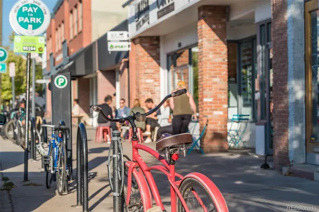 a view of a patio with table and chairs and potted plants