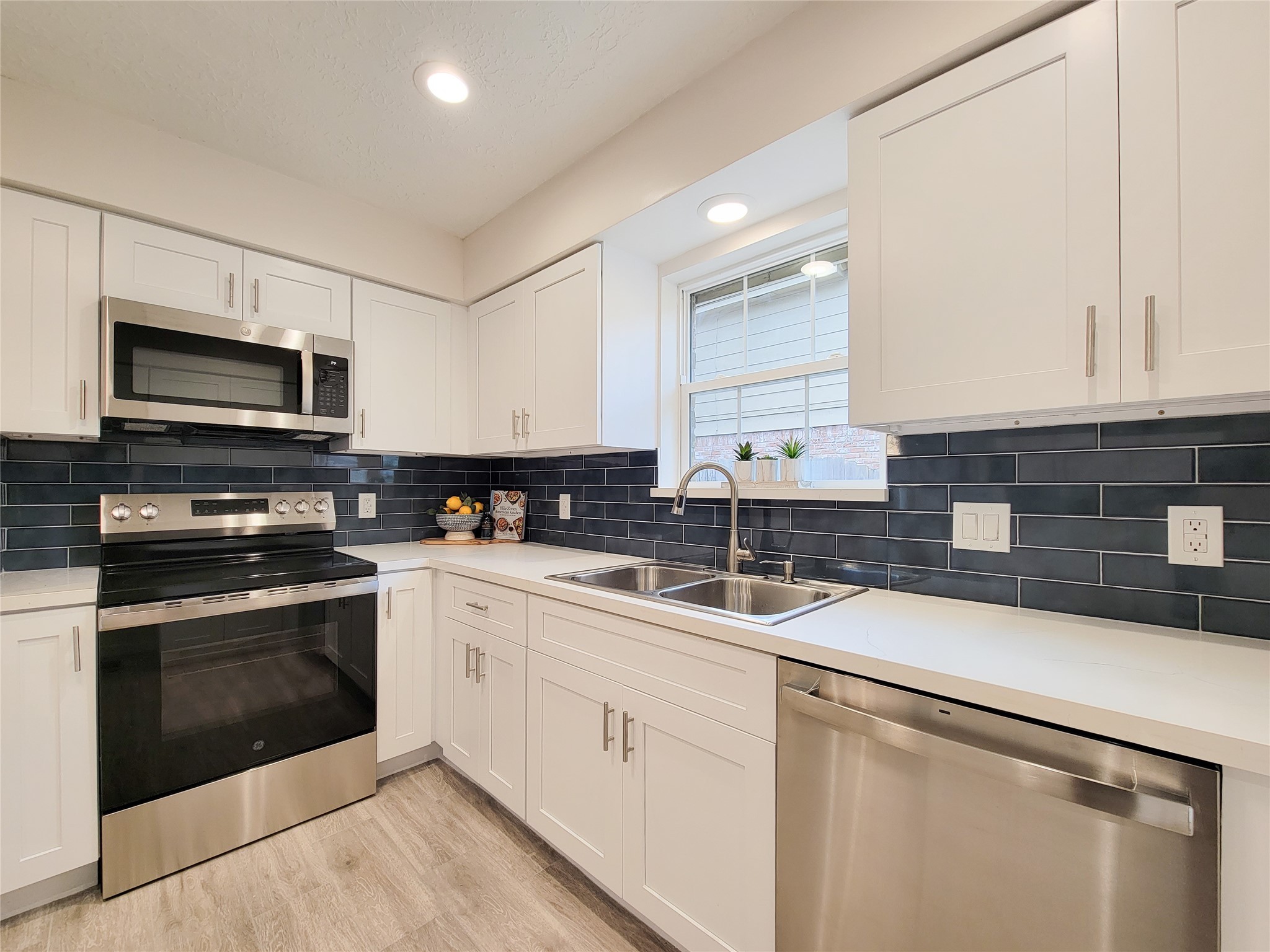 10703 Idlebrook Drive Houston, TX 77070 - Photo 2 of 47 stunning remodeled kitchen with new applicances