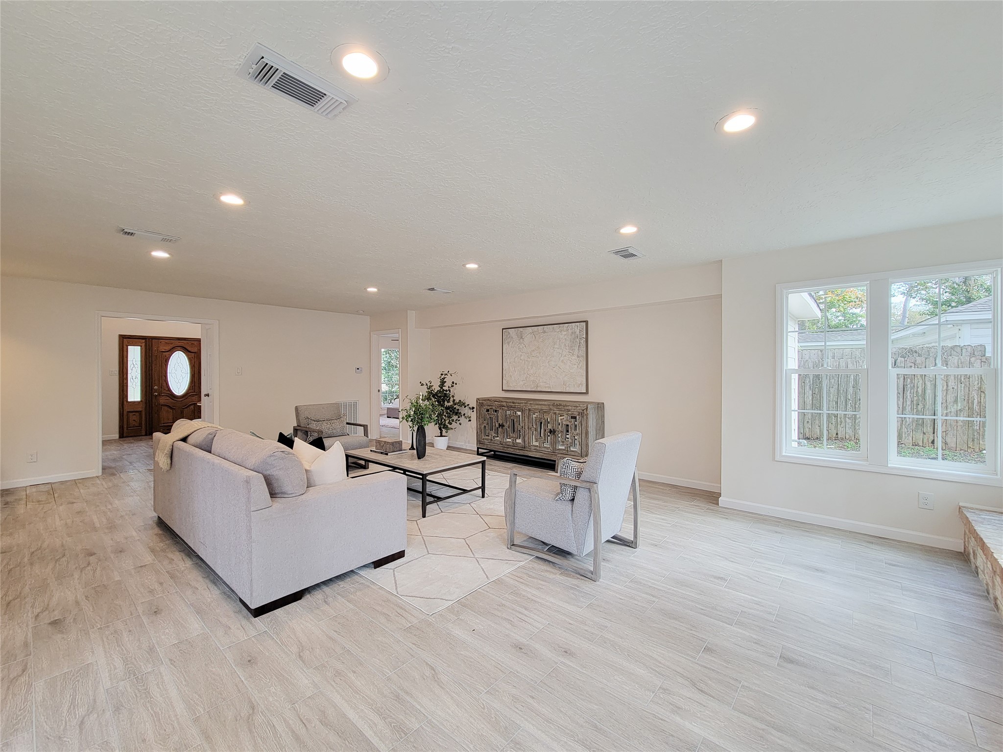 10703 Idlebrook Drive Houston, TX 77070 - Photo 27 of 47 grand living area to fit the whole family and friends