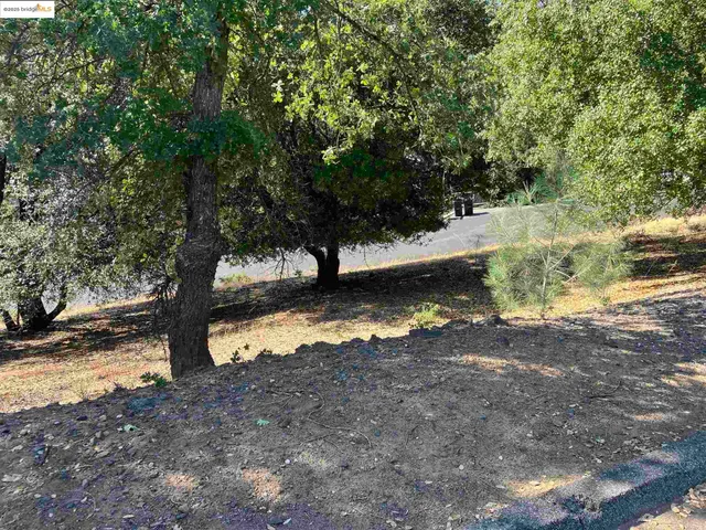 a view of swimming pool with outdoor seating