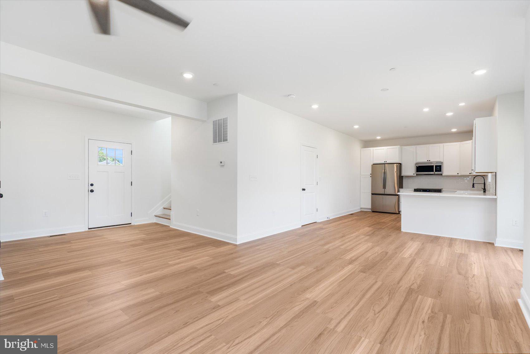 13101 Choptank Avenue Middle River, MD 21220 - Photo 5 of 27 a view of kitchen with wooden floor