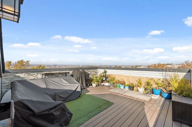 a view of a terrace with a sink and a garden