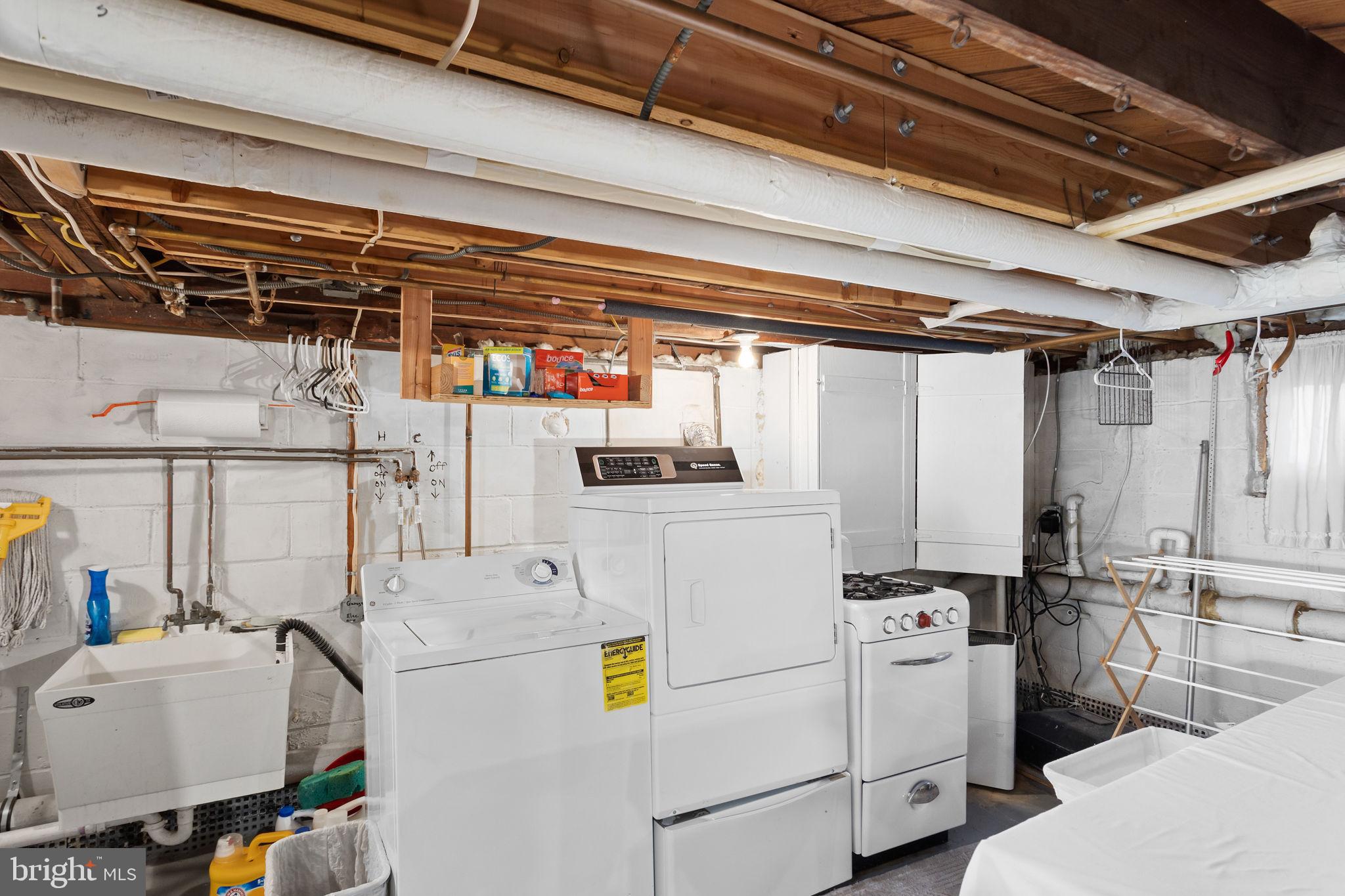 1583 Pennington Road Ewing, NJ 08618 - Photo 24 of 33 a utility room with dryer and washer