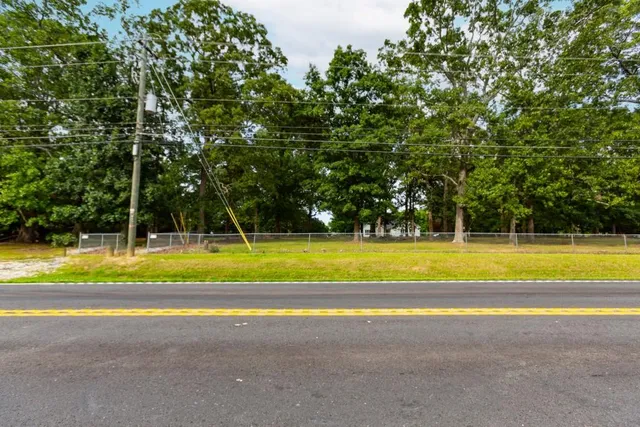 a view of swimming pool with yard