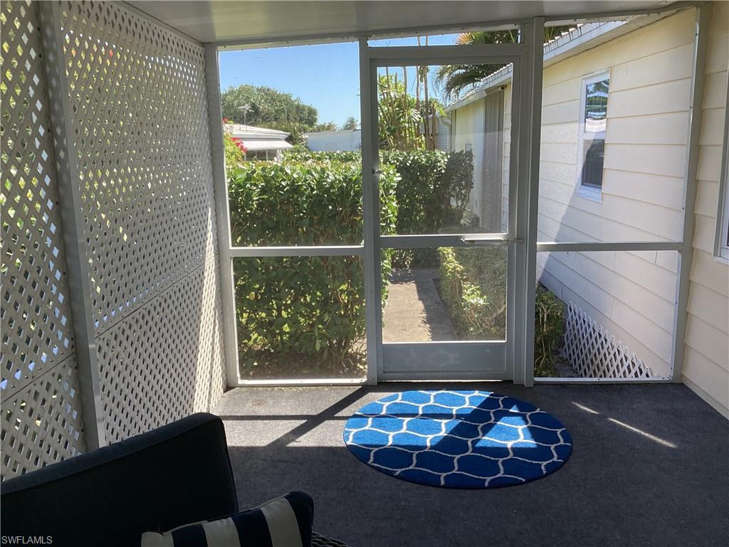 4 Chateau Way Naples, FL 34112 - Photo 25 of 45 a living room with furniture