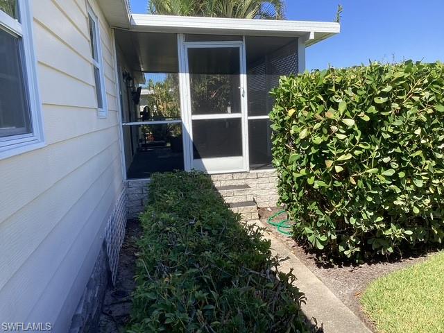 4 Chateau Way Naples, FL 34112 - Photo 29 of 45 a view of a garden