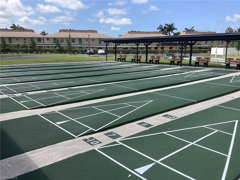 4 Chateau Way Naples, FL 34112 - Photo 32 of 45 a view of a tennis court