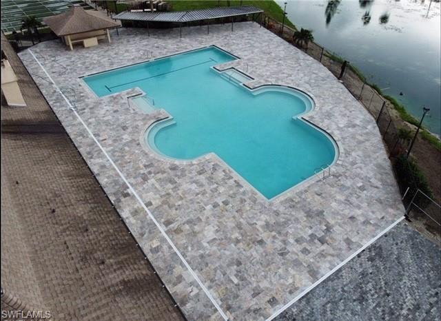 4 Chateau Way Naples, FL 34112 - Photo 45 of 45 a view of a swimming pool with outdoor space