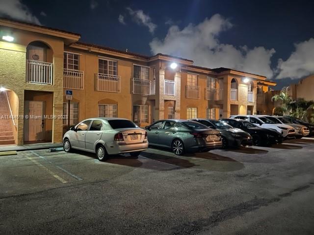 a cars parked in front of a building