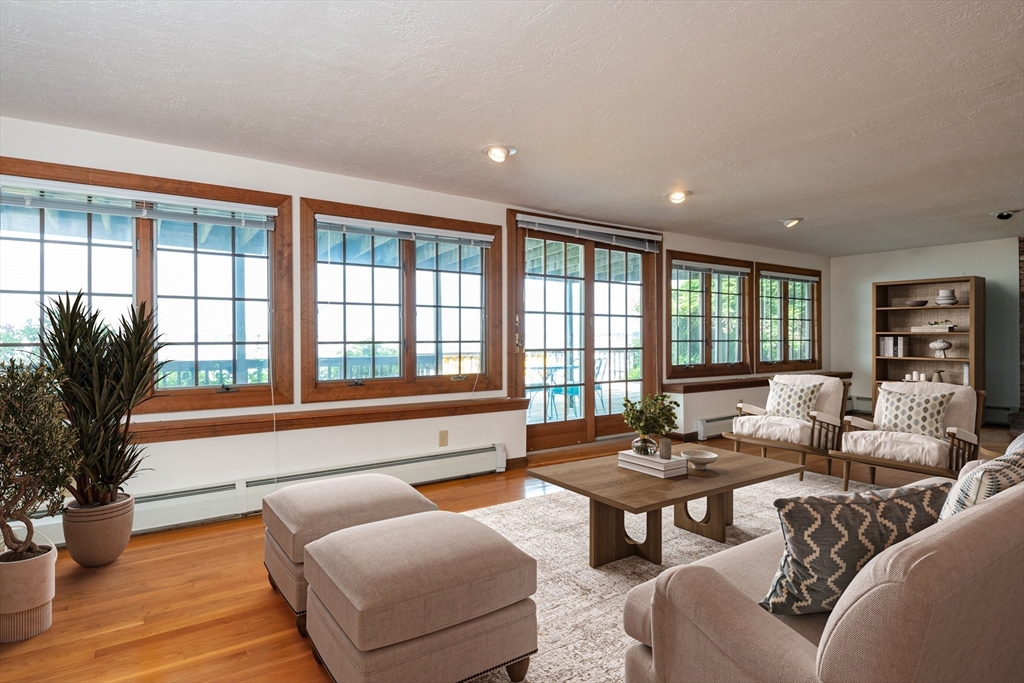 97 Pitman Road Marblehead, MA 01945 - Photo 14 of 37 a living room with furniture and a large window