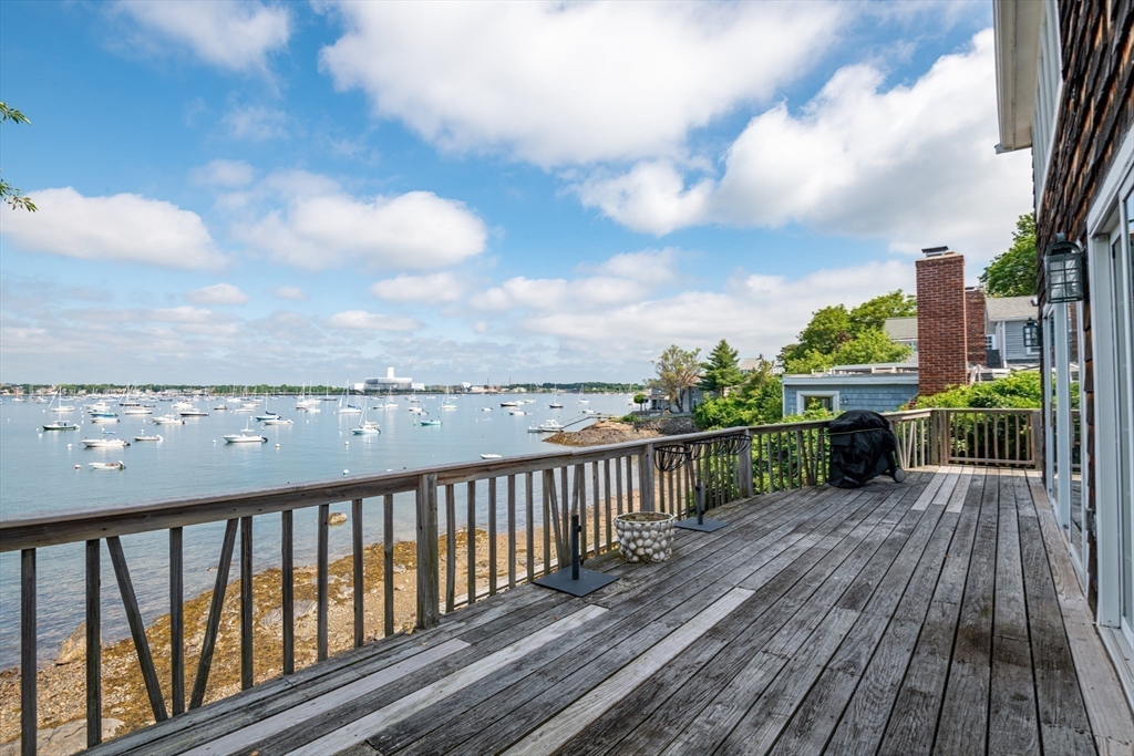 97 Pitman Road Marblehead, MA 01945 - Photo 19 of 37 a view of a balcony with wooden floor