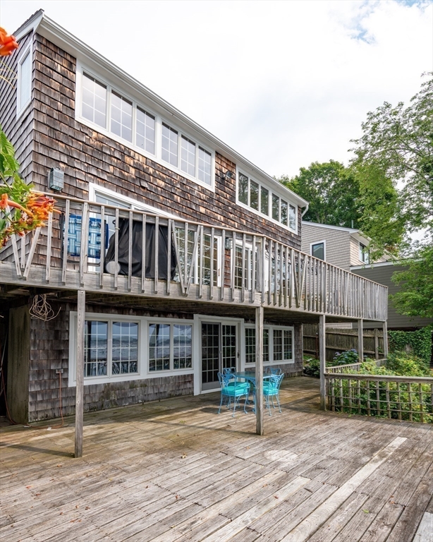 97 Pitman Road Marblehead, MA 01945 - Photo 21 of 37 a front view of a building with garden