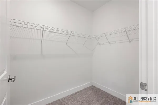 a view of a room with racks on the wall
