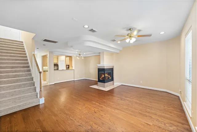 a kitchen with stainless steel appliances granite countertop a sink and cabinets
