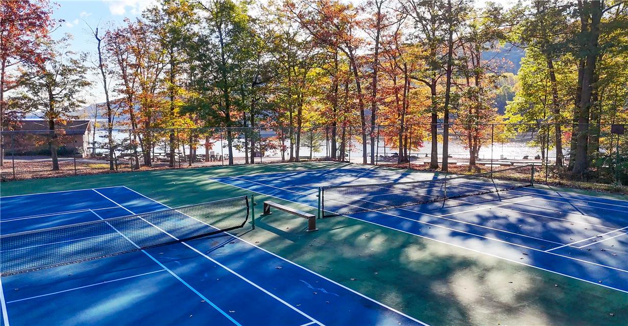 18 White Oak Road Nesquehoning, PA 18240 - Photo 51 of 52 Sporting amenities include a private tennis court with scenic lake views.