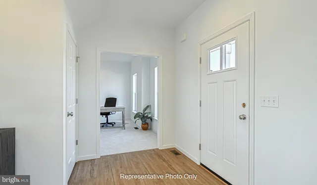 a view of hallway with livingroom and bedroom