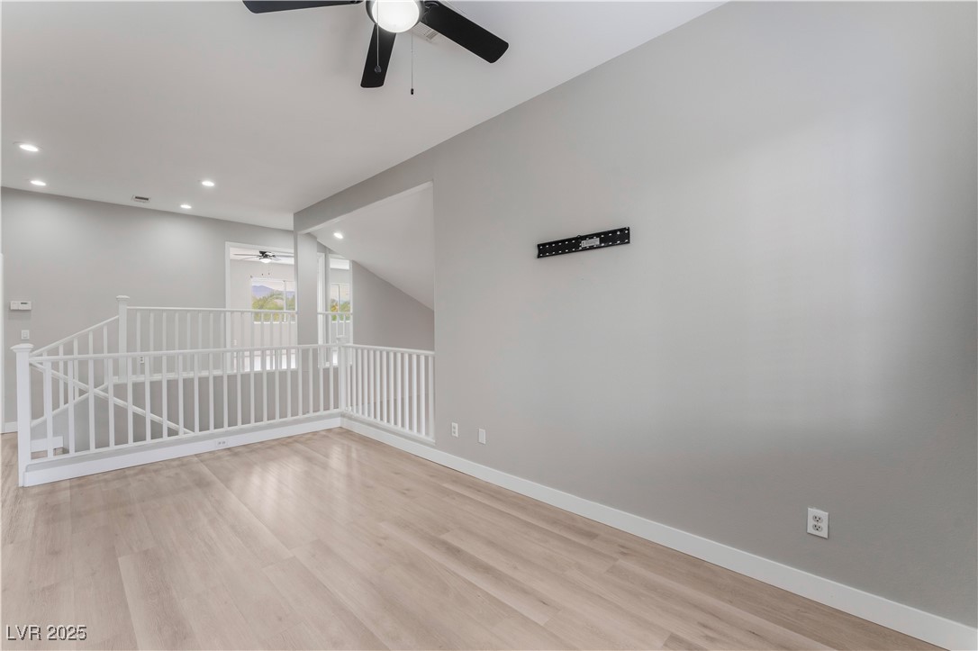 3695 Funston Way Las Vegas, NV 89129 - Photo 23 of 43 Empty room featuring recessed lighting, light wood-style floors, and ceiling fan