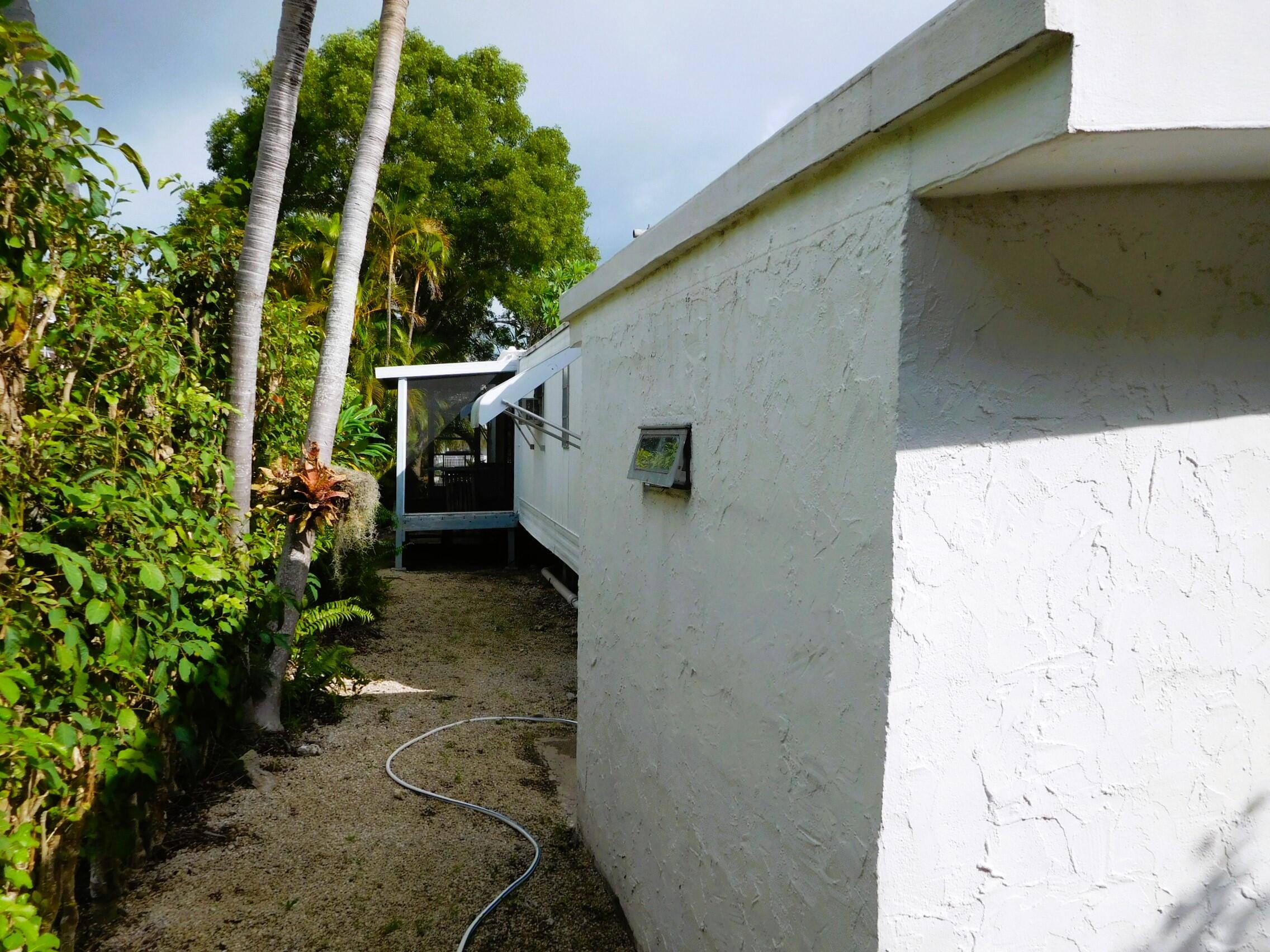 907 Plantation Road Key Largo, FL 33037 - Photo 28 of 39 outside back right shed