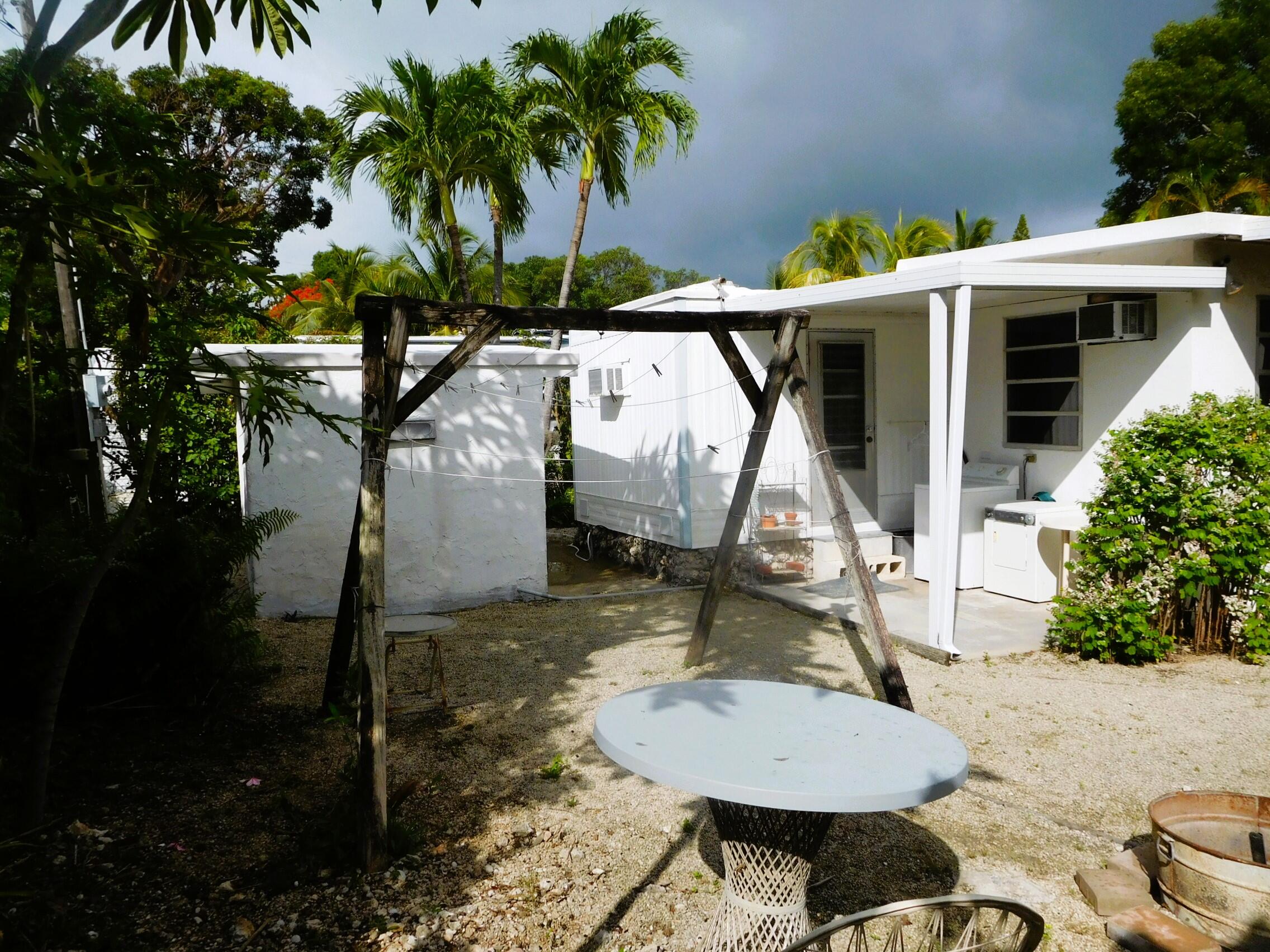 907 Plantation Road Key Largo, FL 33037 - Photo 4 of 39 outside back left