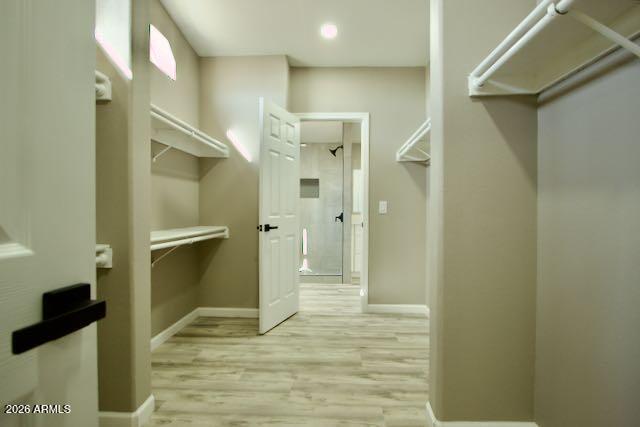 1470 South Bowman Road Apache Junction, AZ 85119 - Photo 37 of 56 a bathroom with a shower and a glass door