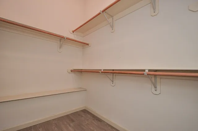 a view of a room with racks on the wall